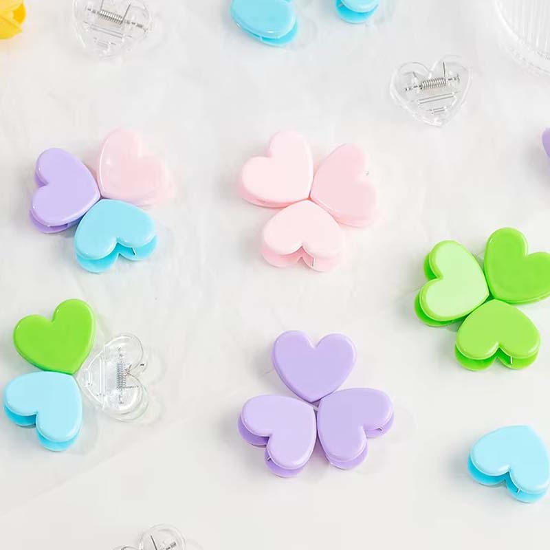 Clip acrylique transparent pour reliure en forme de cœur