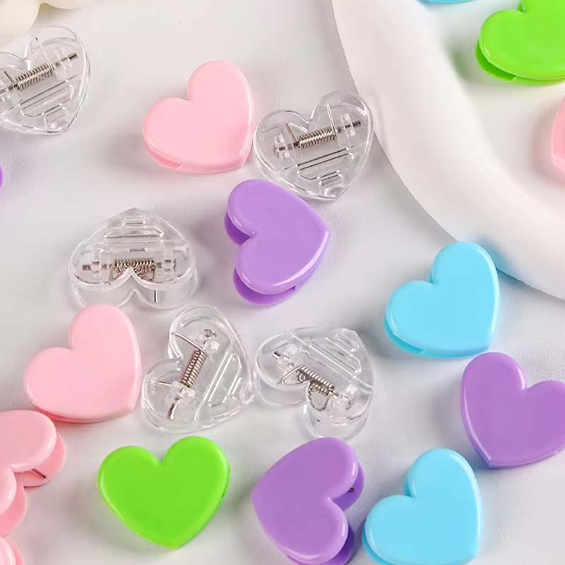 Clip acrylique transparent pour reliure en forme de cœur